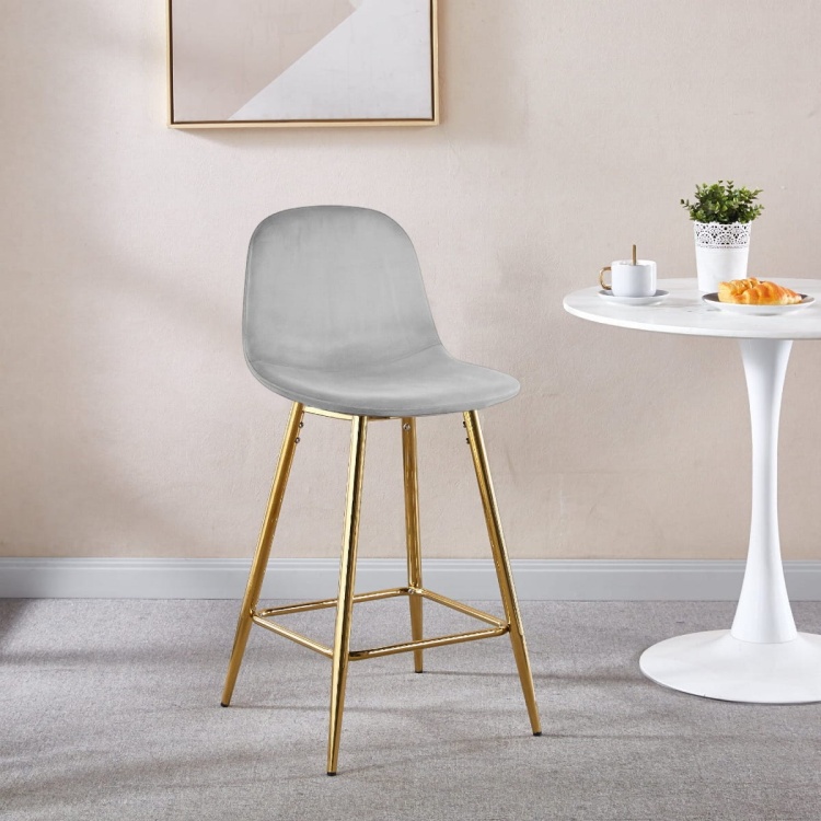 Hoker tapicerowany niski Nilson szary, nogi złote 65 cm