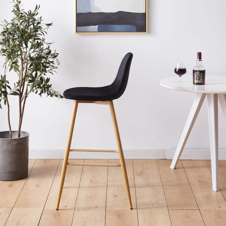 Hoker tapicerowany Nilson czarny, nogi motyw drewno 75 cm