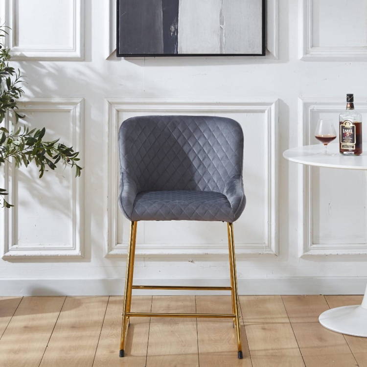 Hoker tapicerowany Colin ciemno szary, nogi złote 63 cm