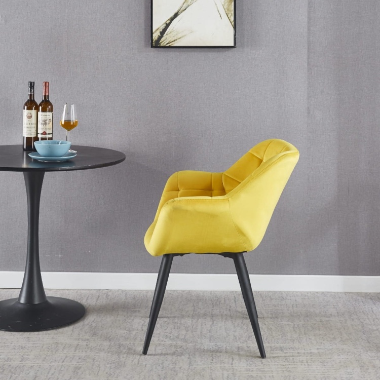 Fotel do salonu Alaska żółty, nogi czarne tapicerowany pikowany welur